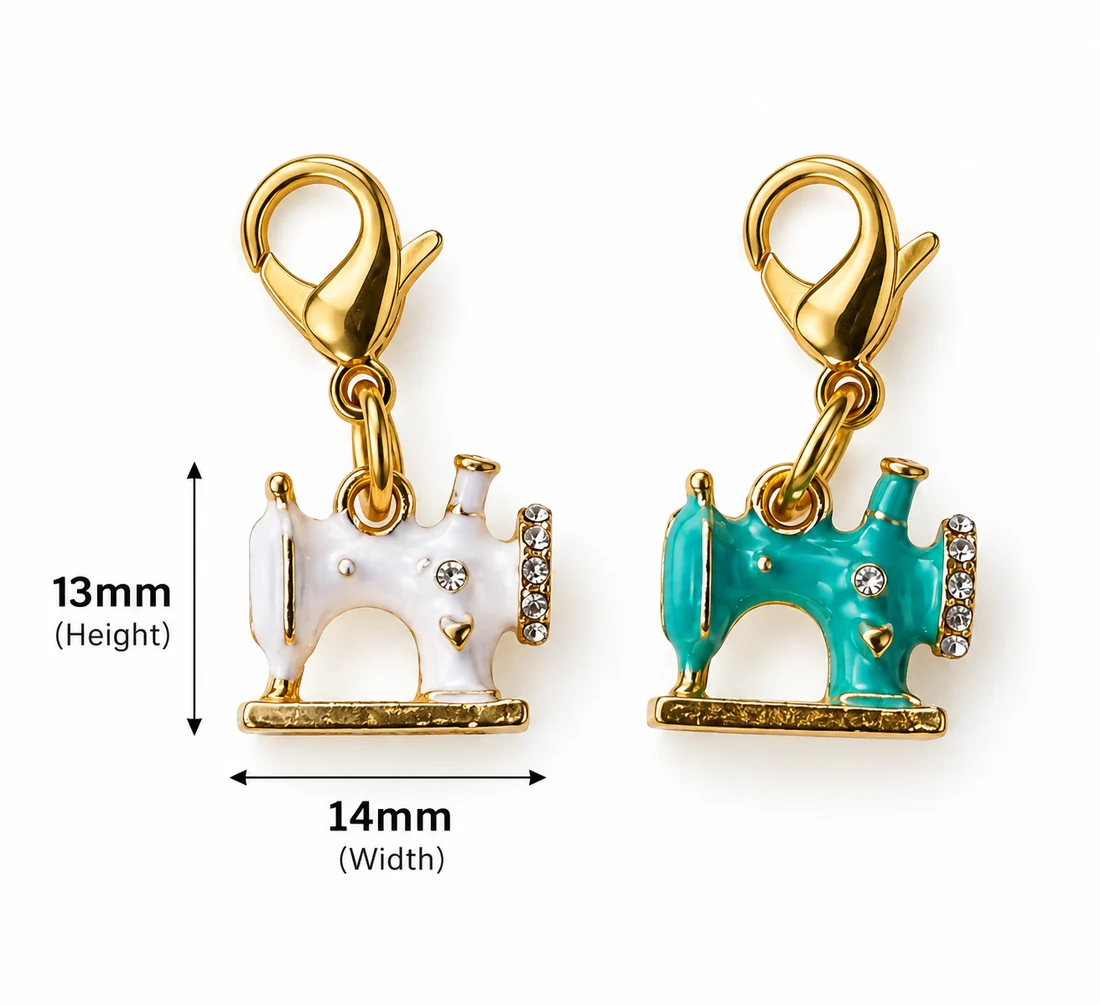 An enamel sewing-machine charm in white and in turquoise, with dimension lines marking 14 mm across and 13 mm high.